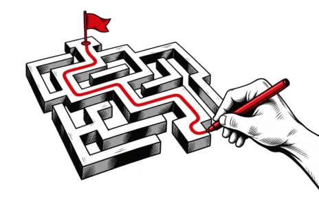 A hand traces a route through a maze toward a red flag.
